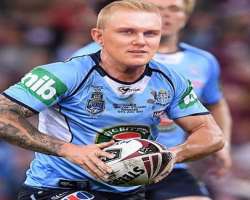 He was a player of Australian Rules Football while growing up.